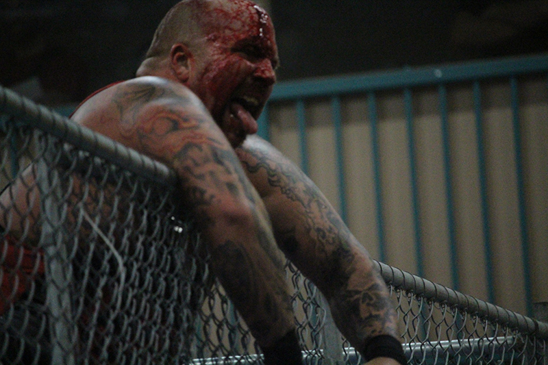 Steele loses steel cage bout